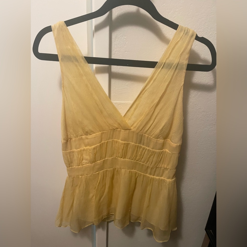 Yellow peplum top, size 2
